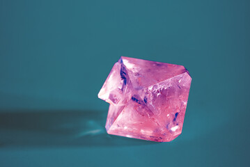 Natural crystal of the mineral corundum on a blue background