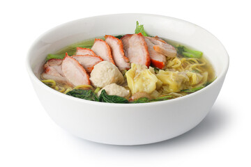 egg noodles with pork wonton soup or pork dumplings soup and vegetable isolated on white background with clipping path, Asian food style.