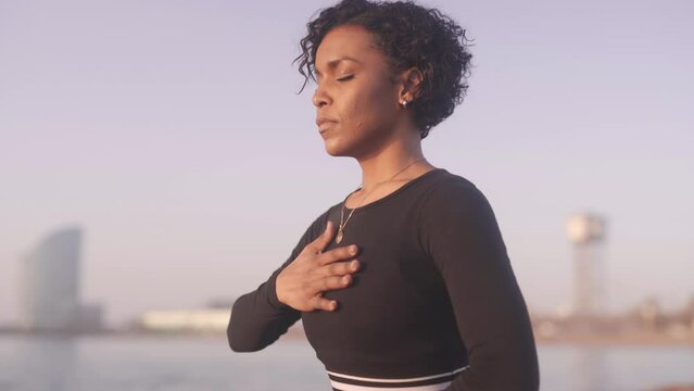Remidial deep breathing at Barcelona Spain by Black yogi