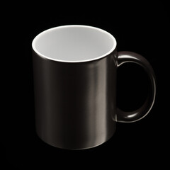 black mug mockup on black background.