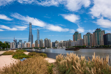 Obraz premium Modern buildings along the Huangpu River in Shanghai, China