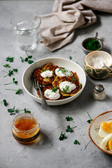 Zucchini pancakes with pike caviar