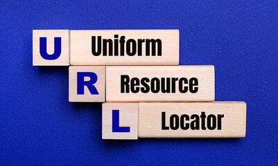 On a bright blue background, light wooden blocks and cubes with the text URL Uniform Resource Locator