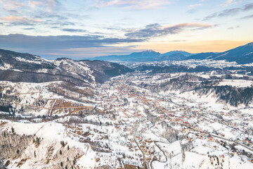 Search of some great views, check out Romania. Sunset aerial with Moeciu and Bran in Brașov County, Transylvania