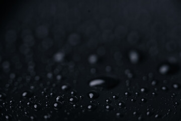 Water drops on black background