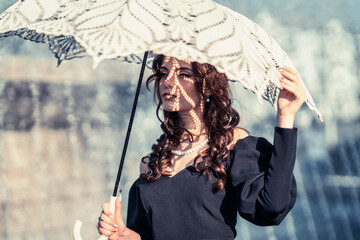 blue-eyed girl with an umbrella