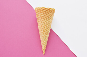 waffle cone on geometric colorful background
