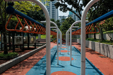 Hanging monkey bars on kids playground. Healthy outdoor activity for kids and adults in city