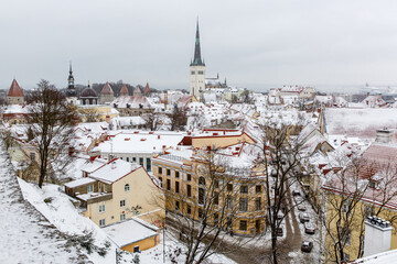 Tallinn old town in winter. Snow on the roofs.