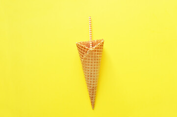 waffle cup with paper tube on yellow background