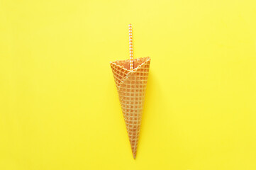 waffle cup with paper tube on yellow background