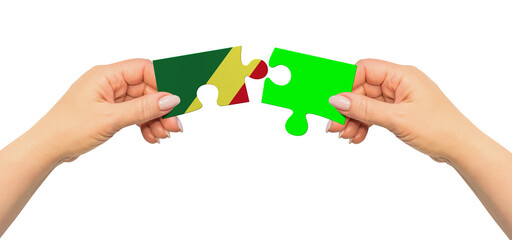 Woman hands are holding part of puzzle game. National mock up on white background. Congo