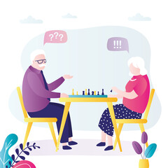 Elderly man playing chess with his wife. Grandmother makes move with piece on chessboard
