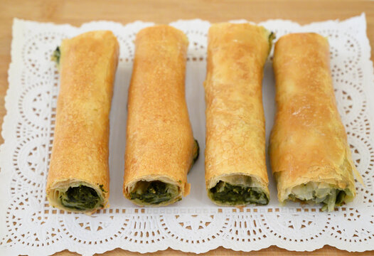 Iconic rustic Romanian and Moldavian pies with greens and spinach filing.