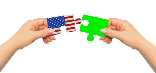 Woman hands are holding part of puzzle game. National mock up on white background. USA
