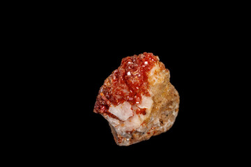 Macro mineral stone Vanadinite on a black background