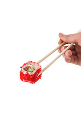 male caucasian hand holding chop sticks with one california roll sushi isolated on white background