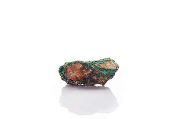 malachite formation on white background Malachite is a secondary ore of copper that is generally...