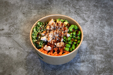 Set of fresh poke bowl with salmon, avocado, chukka, basil,shrimp and smoked fish on red background