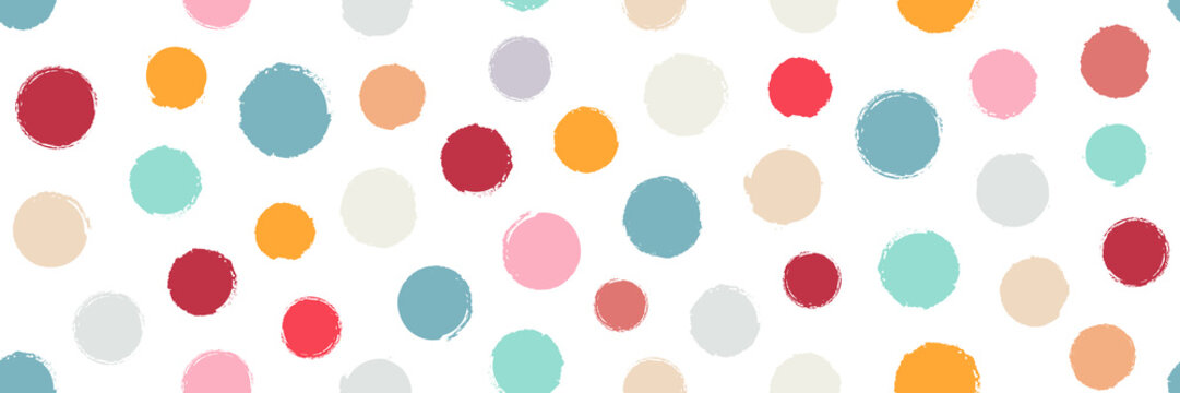 Abstract seamless colorful geometric circles pattern on white background. Modern simple cute style hand drawn circles brush texture elements. Suit for printing, wallpaper, wrapping paper