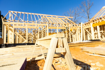 New house under construction during the framing process