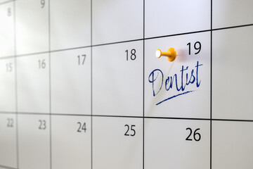 Dentist appointment concept. A calendar with an entry 