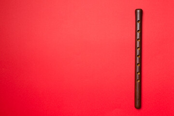 Armenian national musical instrument duduk on color background. Top view