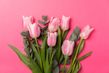 Fototapeta premium Pink tulips on a lilac background.Top view. Spring bouquet.Holiday concept.Women's day, Valentine's day,Easter, birthday.Copy space.
