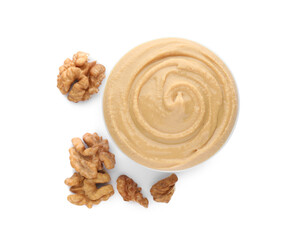 Bowl of tasty walnut butter isolated on white, top view