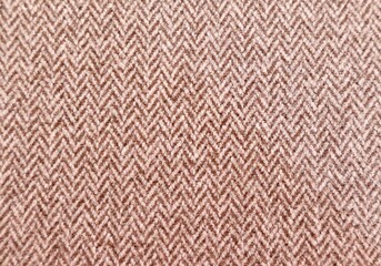 Full frame brown and white textured herringbone furnishing or fashion fabric