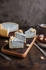 Delicious cottage cheese poppy-seed cake made of shortcrust pastry decorated with biscuits. Cheesecake with different beautiful layers. Easy Sweets Recipes