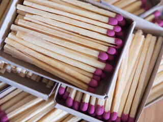 Several boxes filled with matches, a close-up shot. Matchboxes.