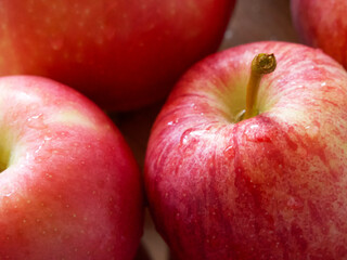 Fototapeta na wymiar Macro photo of ripe red apples of gala and Ligol varieties. Apple close-up.