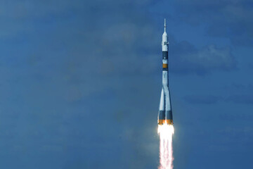 Take off space rocket on a background of blue sky and sun. Elements of this image were furnished by NASA