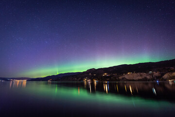 Northern Lights sitting over the top of the Horizon on Okanagan Lake