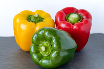Green , yellow and red bell pepper.