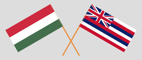 Crossed flags of Hungary and The State Of Hawaii. Official colors. Correct proportion
