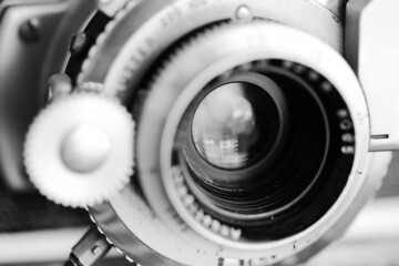 Vintage old photography film camera with lens. Close up macro shot
