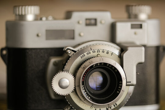 Vintage old photography film camera with lens. Close up macro shot