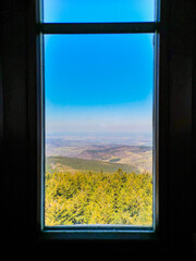 Beautiful landscape of mountains framed in window of viewing tower