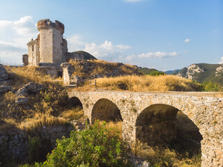 Ruines of Castel Gavone with romanic bridge, Perti, Finale Ligure, Italy - obrazy, fototapety, plakaty
