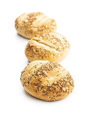 Baked bun bread with cumin seeds isolated on white background.