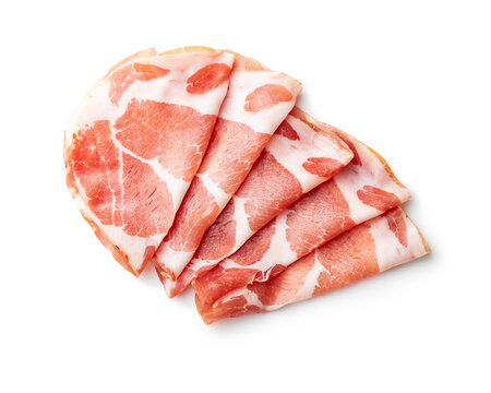Italian dried ham. Coppa Stagionata isolated on white background.
