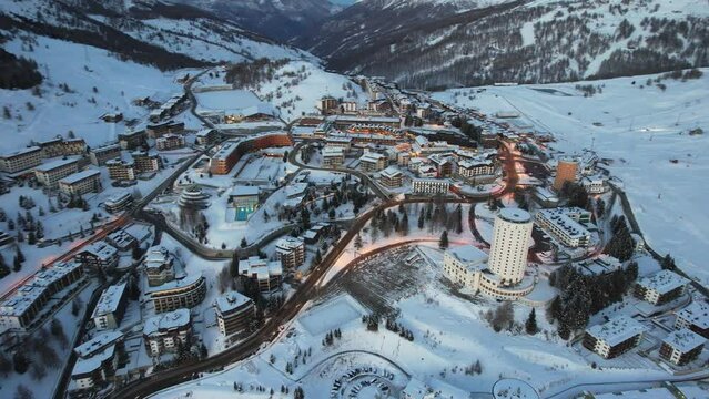 Aerial view of Sestriere village from above, famous ski resort in the italian western Alps, Piedmont, Italy.