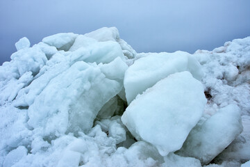 Ice hummocks on the coast of the Gulf of Finland in the spring (winter) season. Zelenogorsk, St. Petersburg, Russia.