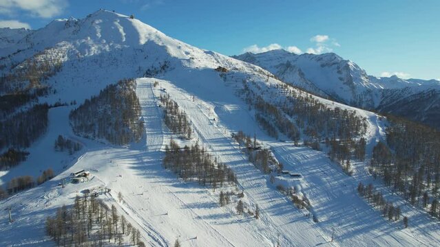 Aerial view of Sestriere village from above, famous ski resort in the italian western Alps, Piedmont, Italy.