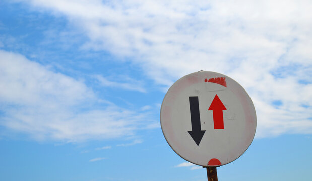 Road Sign That Shows Right Of Way On Cloudy Day