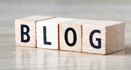 Word BLOG arranged from wooden letters.