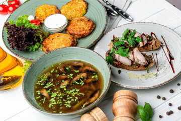Three-course set on a table. Tasty lunch set made of three meals