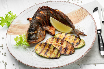 Fresh grilled dorado with zucchini